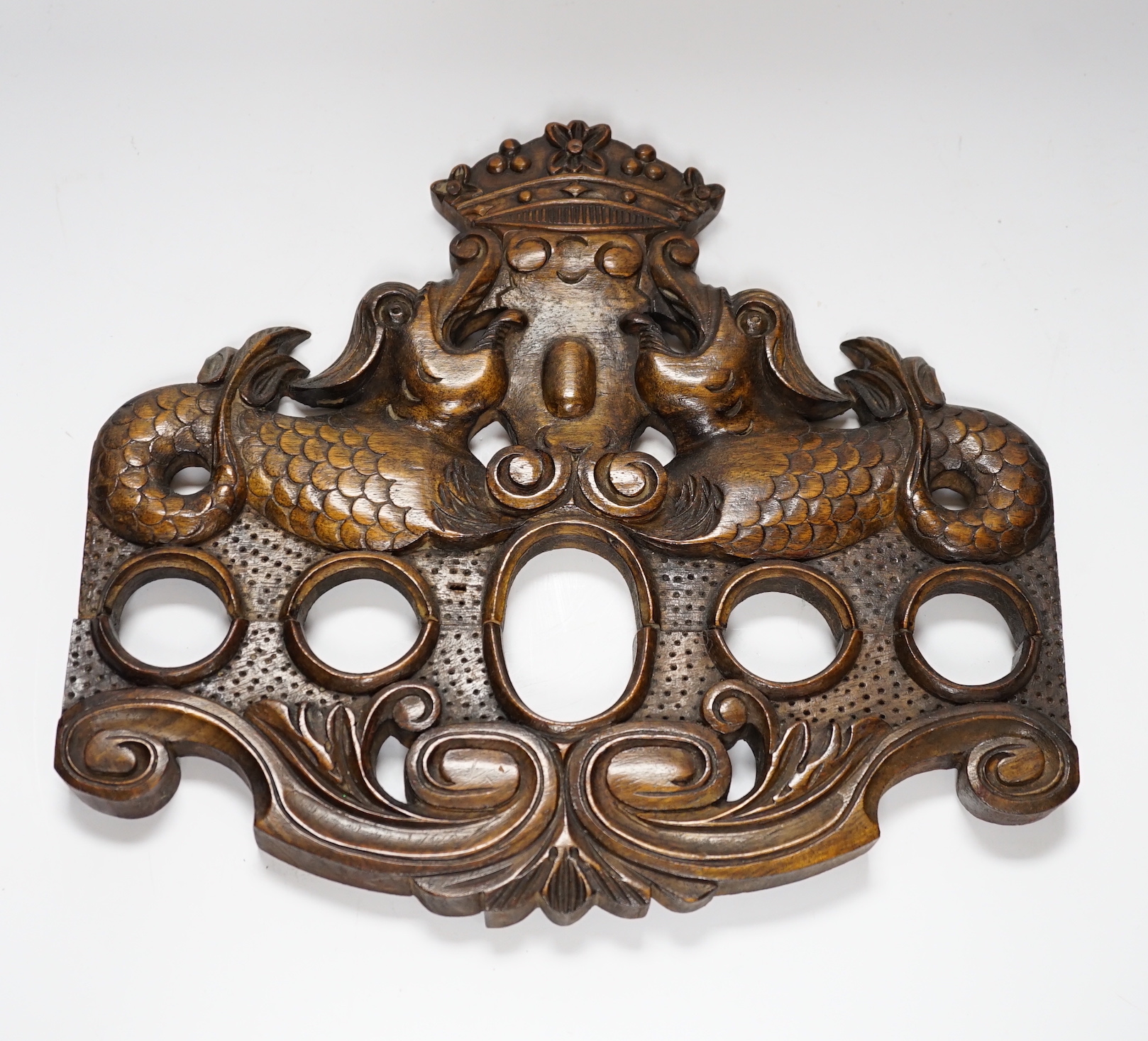 An 18th century style carved walnut armorial plaque, 28.5x32cm